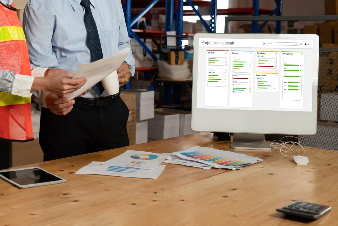 Site Reliability Engineer analyzing system performance metrics on a digital dashboard interface.